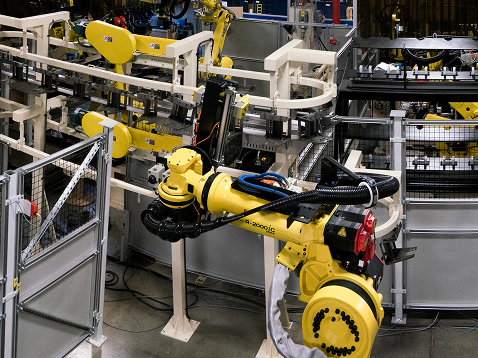 A manufacturing line of custom robotic laser systems