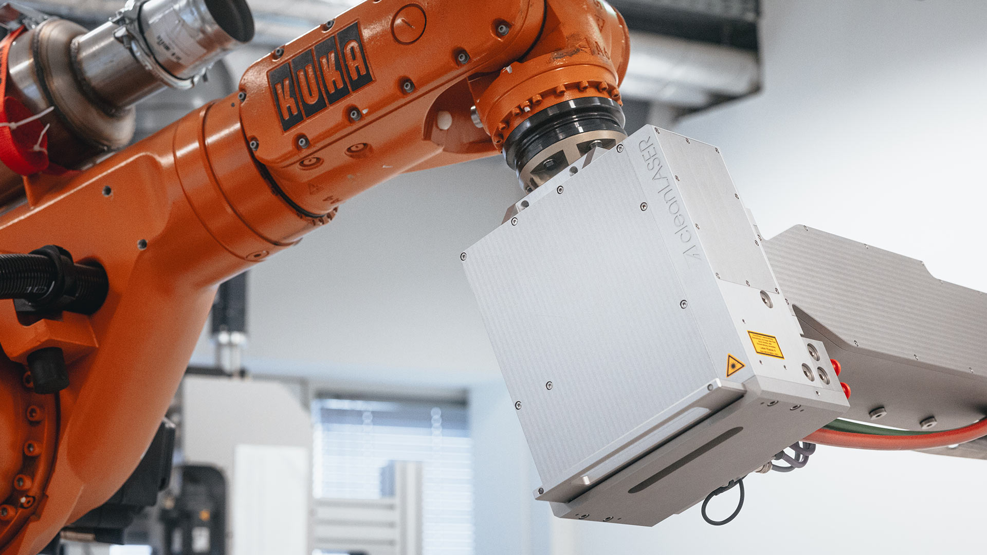 A robotic arm equipped with laser cleaning optics